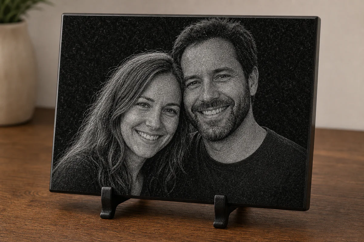 Laser-engraved couple portrait on a black granite plaque